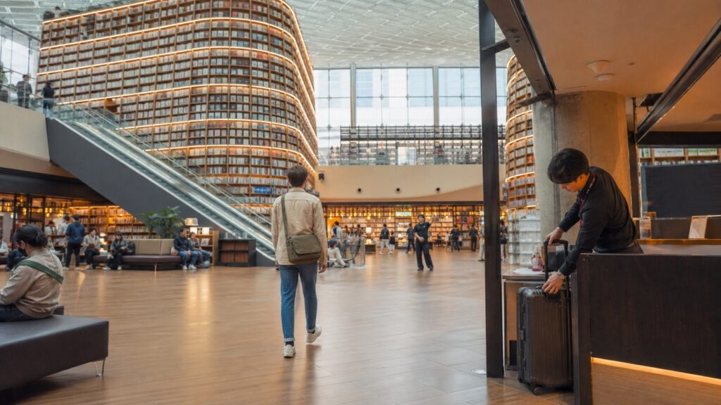 Traveler visiting COEX Starfield Library after arranging luggage storage